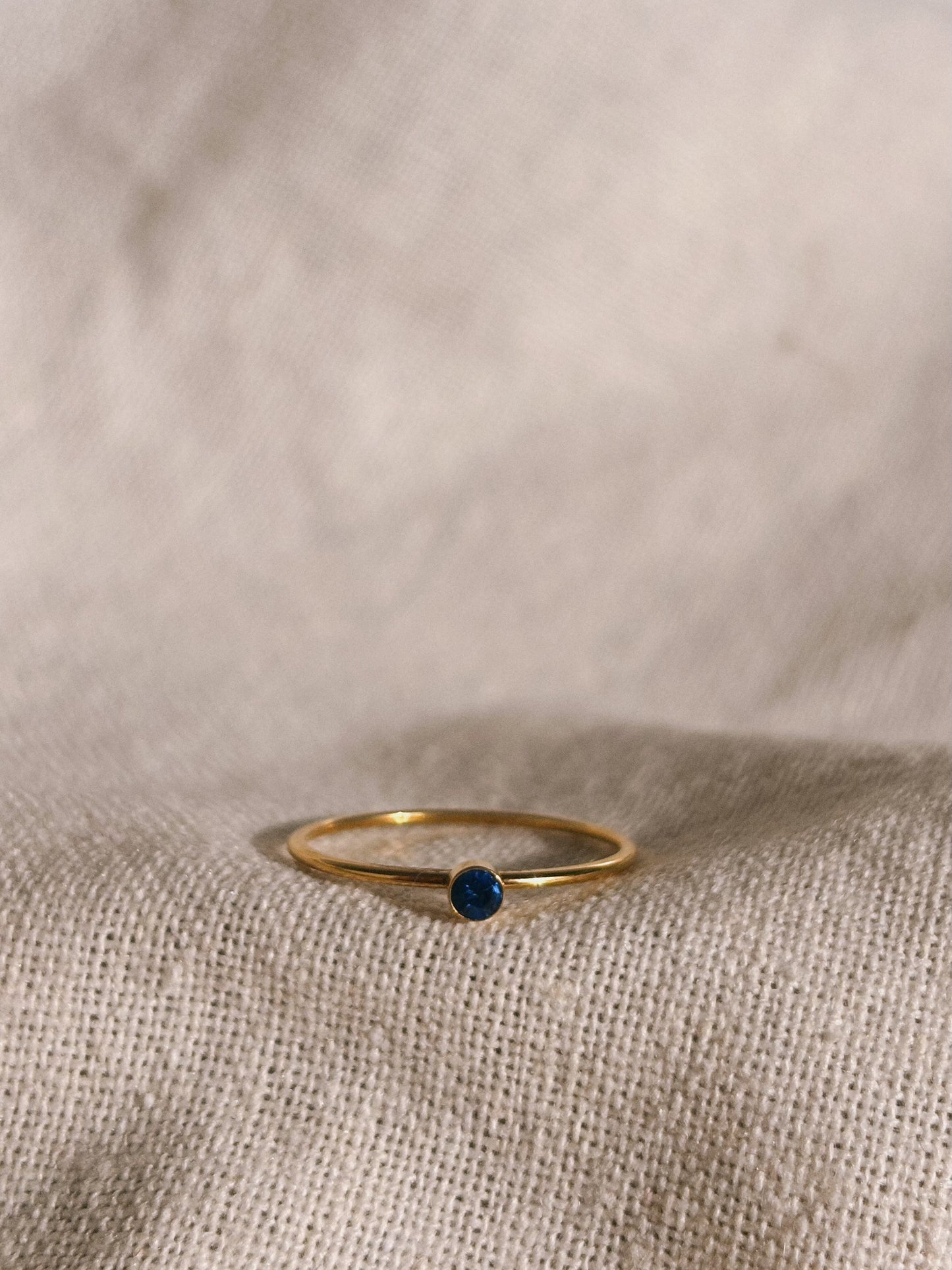 RENA Blaue Glassperle Ring Gold